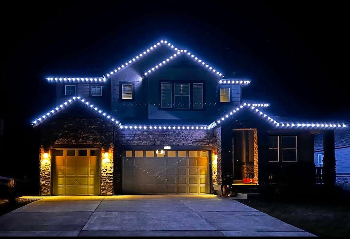 Permanent white Christmas LED lights on full two-story home